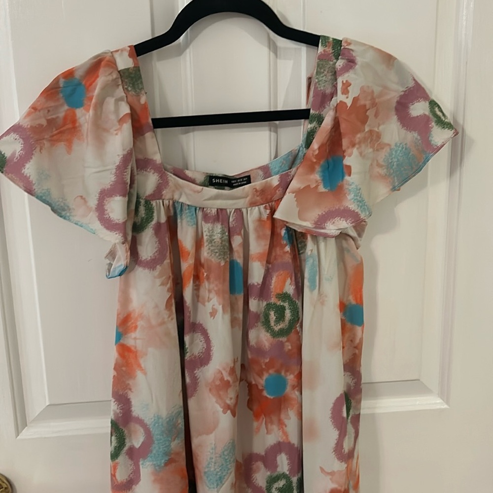 Really pretty colorful dress. Size small/US 4.